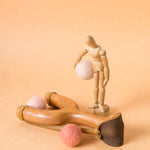 slingshot catapult wooden toy handmade felt ball vegetable dyed waldorf toy open ended toy natural materials toys for boys