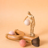 slingshot catapult wooden toy handmade felt ball vegetable dyed waldorf toy open ended toy natural materials toys for boys