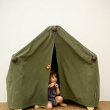 Transformable Pikler jungle gym being used as a tent house for kids