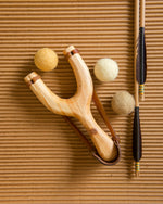 slingshot catapult wooden toy handmade felt ball vegetable dyed waldorf toy open ended toy natural materials toys for boys 